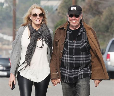 neil young leaves wife for daryl hannah.